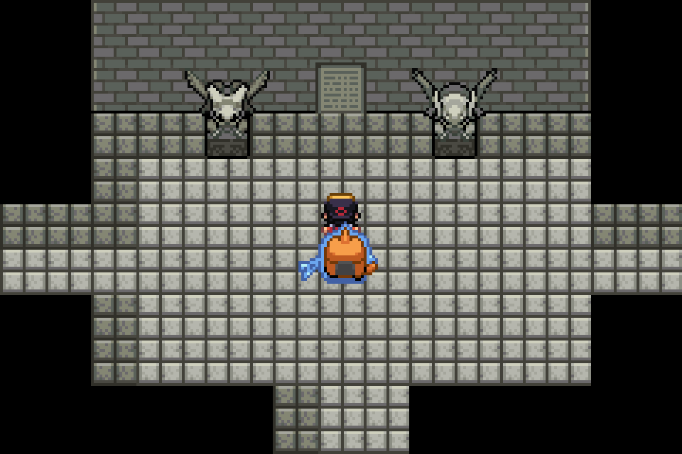 SoulGold player inside a dark stone chamber with Pokémon statues